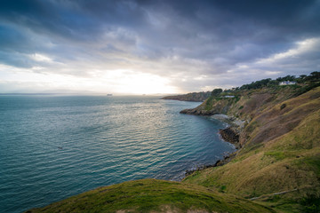 Fototapeta premium Sunset over the coast of Howth near Dublin in Ireland