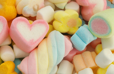 Mixed colorful marshmallow candies background