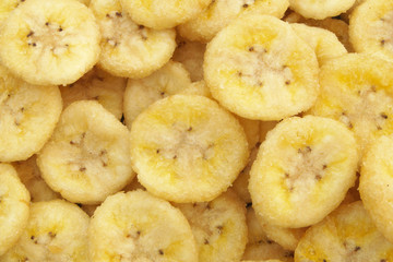 Dried banana chips as background