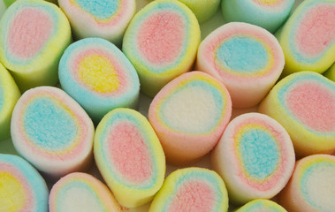 Coloful marshmallow candies background