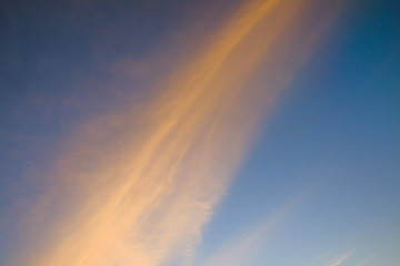 Fototapeta premium Flying and traveling, view from airplane window on the wing on sunset time