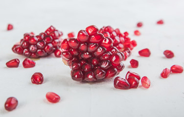 Peeled Pomegranate Seeds On White Background 