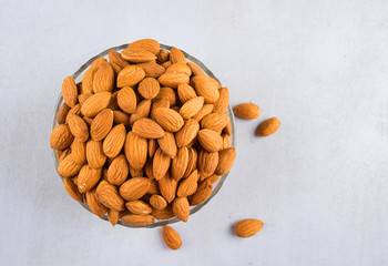 Almond In A Bowl On Grey Background