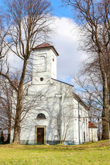 Naklejka premium DOBCZYCE, POLAND - MARCH 20, 2019: Church on the castle hill