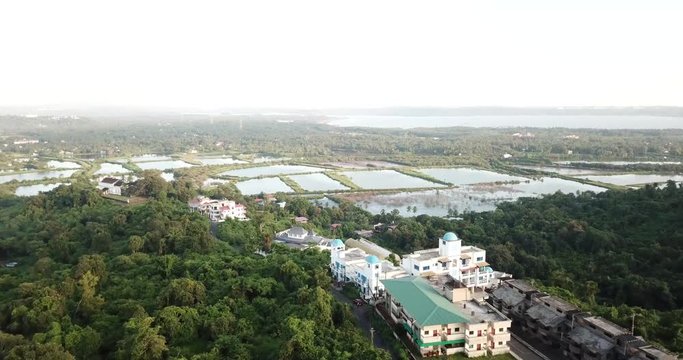 Drone shot flying over beautiful architectural buildings