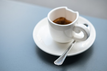 Cat shaped cup of coffee