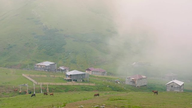 Clouds descend on an old village high in the mountains in Georgia