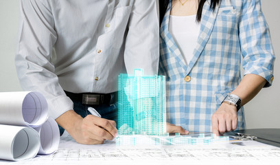 Engineer team work for the design of the sheet plan display technology building model