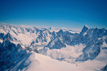 Naklejka na ściany i meble Snow covered French Alps