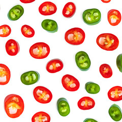 Red chili pepper Pattern. Slices of Cayenne pepper isolated on white background.
