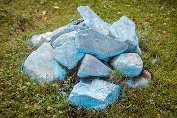 A pile of granite painted stones