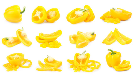 Set of ripe yellow bell peppers on white background
