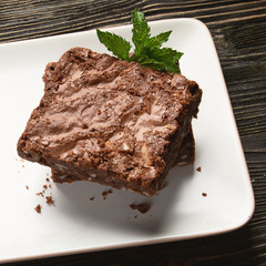 Chocolate brownie cake served on rectangle plate