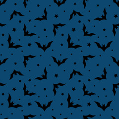Vector seamless pattern with bats on blue background. Simple halloween design for greeting card, gift box, wallpaper, fabric, web design.