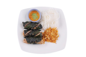 Vietnamese food, Grilled Pork Wrapped in Wild Betel Leaf served with rice noodles and sweet sauce,...