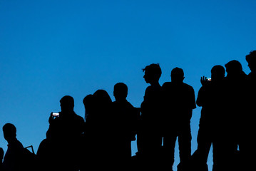 Fototapeta na wymiar Silhouette of concert crowd
