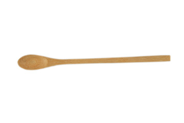 Wooden spoon on white background.