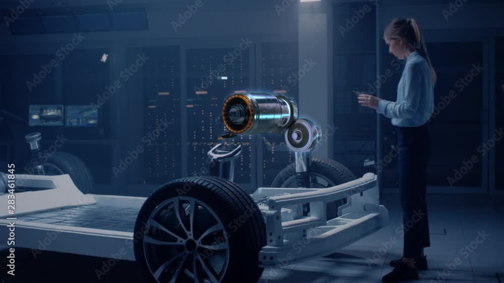 Poster Female Automobile Engineer Using Digital Tablet with Augmented Reality Analyses Electric Engine Prototype. Innovative Facility: Vehicle Frame with Graphics Showing Motor Parts, Torque and Infographics