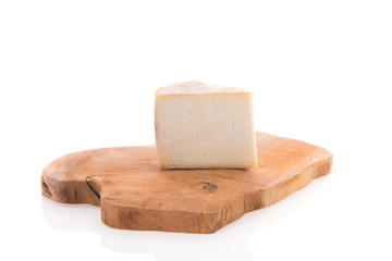 Goat cheese on cutting board