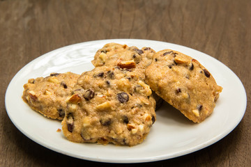 Chocolate chip cookies on white plate