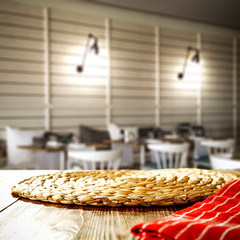 Obraz premium Table background and restaurant interior. Empty space for products and decoration.