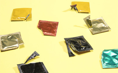 High angle opened condoms wrappers
