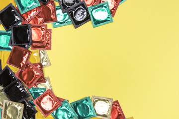 Top view circular frame with colourful condoms