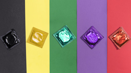 Top view condoms on same colour background