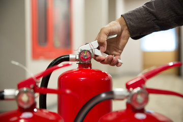 Fire extinguishers, Engineers are checking fire extinguishers.