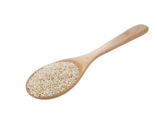 White Sesame seeds on wooden  spoon isolated on white background.Organic natural sesame seeds and extract oil concept