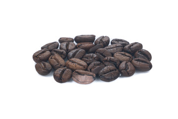 Pile Roasted brown coffee beans isolated on white background.close up