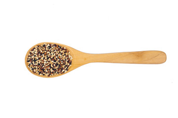 Mix seeds quinoa grains (white quinoa, black quinoa, red quinoa) in wooden spoon isolated on white background.Organic food and Healthy food concept