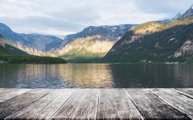 lake with mountain in summer with wooden patio