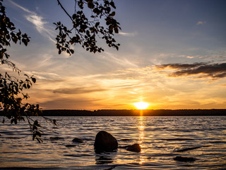 Fototapeta na wymiar Golden sunset on the Volga river