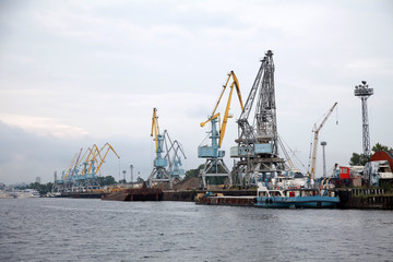 Fototapeta na wymiar cargo harbor port crane infrastructure of river port in Kazan, Russia