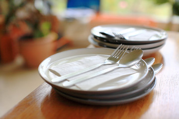 table of food setting dish spoon and fork