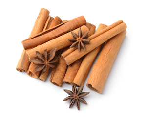Aromatic cinnamon sticks on white background