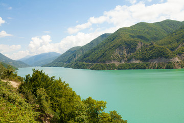 Fototapeta na wymiar Reservoir Ginvali in Georgia, blue water. Jinvali.
