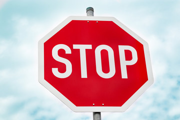 Obraz premium Closeup stop sign on blurry background