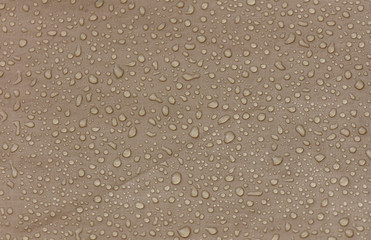 Raindrops on a tent as an abstract background