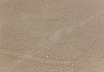 Raindrops on a tent as an abstract background