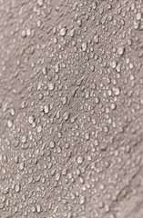 Raindrops on a tent as an abstract background