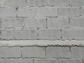 Brick wall block paint white color rough surface texture material background Weld the joints with cement grout