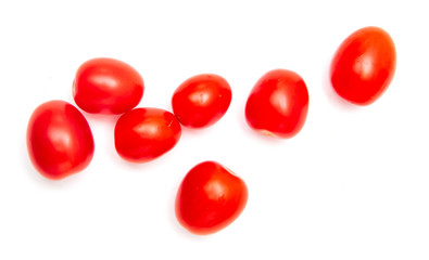 Red cherry tomatoes on a white background