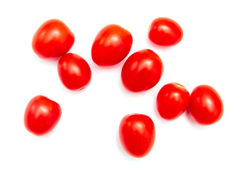 Red cherry tomatoes on a white background