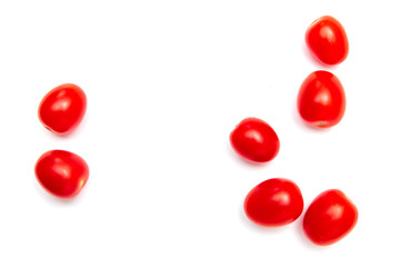 Naklejka na ściany i meble Red cherry tomatoes on a white background