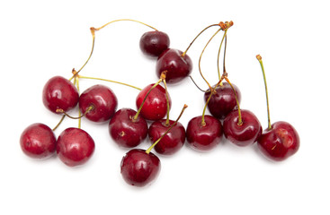 Obraz na płótnie Canvas Ripe cherry berries on a white background