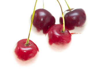 Ripe cherry berries on a white background