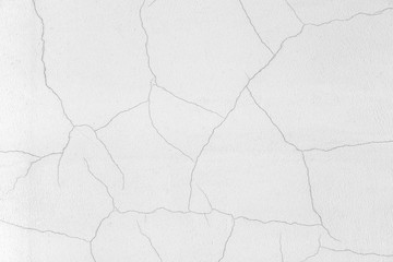 Cracks in the white plaster