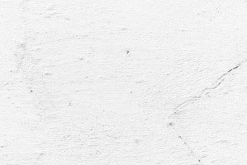 Texture of a concrete wall with cracks and scratches which can be used as a background